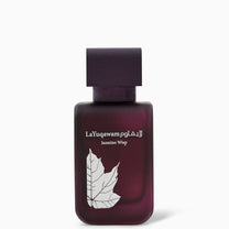 A purple bottle of La Yuqawam Jasmine Wisp perfume with a leaf design and white text.